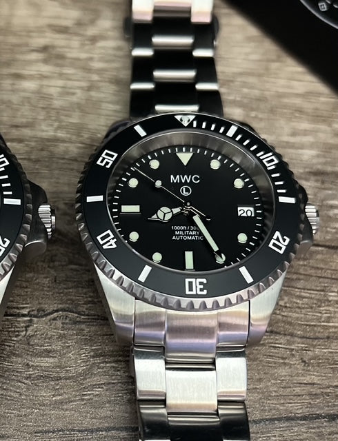 MWC 24 Jewel 300m Automatic Military Divers Watch with Sapphire Crystal and Ceramic Bezel on a Matching Stainless Steel Bracelet